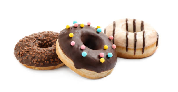 istock Sweet tasty glazed donuts on white background 1335869094