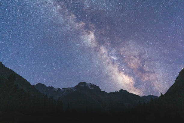 istock Mountains on the background of starry sky 1335870790