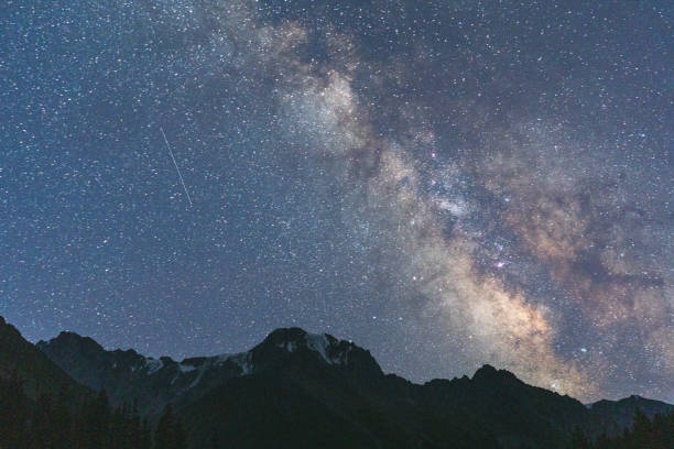 istock Mountains on the background of starry sky 1335870797