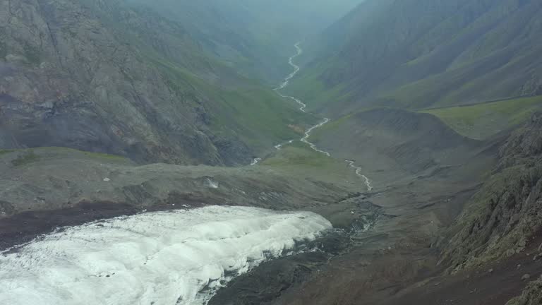 The glacier between the rocks to the source of the river.