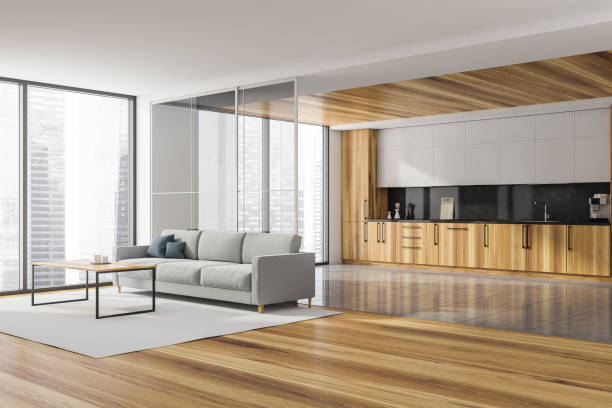 istock Corner view of the panoramic living room with grey sofa, kitchen 1335879421