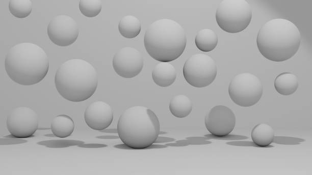 istock Abstract spheres and balls falling and flying 1335886060