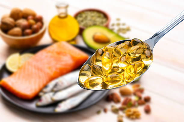 istock Omega-3 capsules or healthy food 1335890101