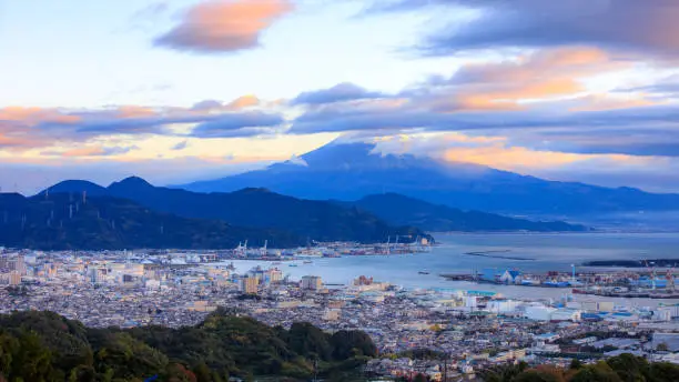 Cityscape and Commercial shipping port of Shimizu bay with top of mount Fuji view background at Shizuoka prefecture at morning in Japan