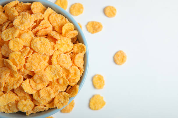 istock Delicious cornflakes in a plate on a light background. 1335892948