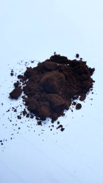 istock Ground coffee on white background. Macro with full dept of field 1335893125