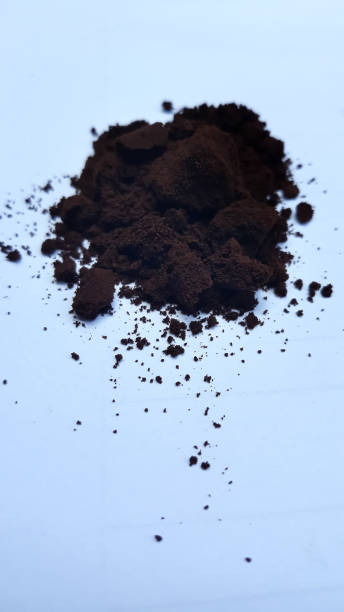 istock Ground coffee on white background. Macro with full dept of field 1335893127