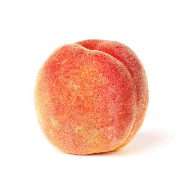 istock whole peach isolated on white background. fresh fruits 1335893308