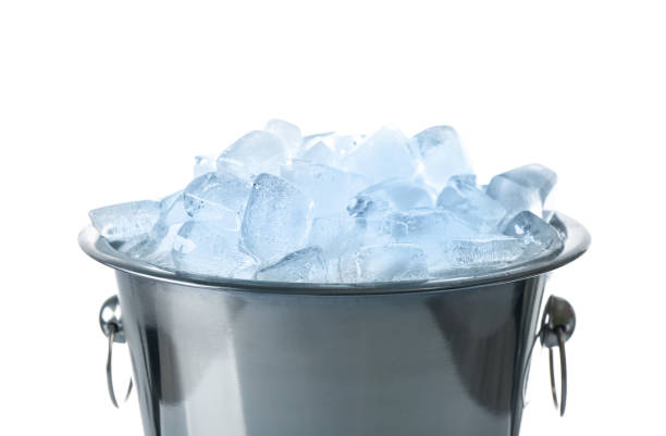 istock Ice cubes in bucket isolated on white 1335894331