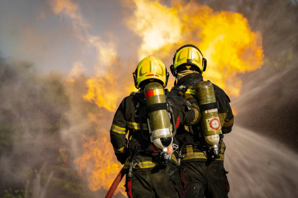 istock Firefighters are conducting fire drills by spraying water to extinguish the raging fire. 1335894509