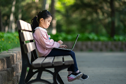 Little Girl Using MacBook