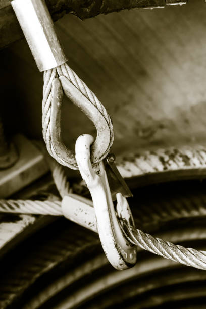 istock A tinted monochrome image of construction wires an a construction hook 1335896969
