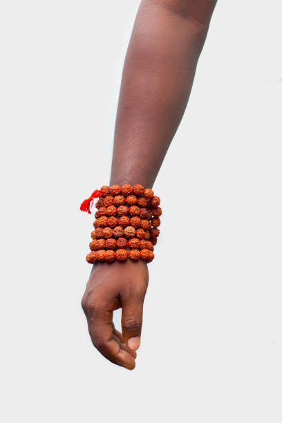 hand with Rudraksha beads for chanting. hand with Rudraksha beads for chanting. raja stock pictures, royalty-free photos & images
