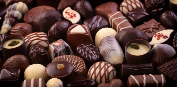 istock variety truffles and chocolate candy, sweet dessert background 1335899984