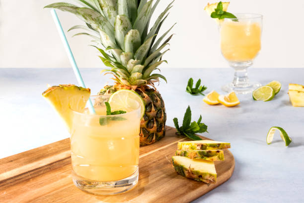 istock Pineapple and Pineapple Juice with lime and mint - stock photo 1335903873
