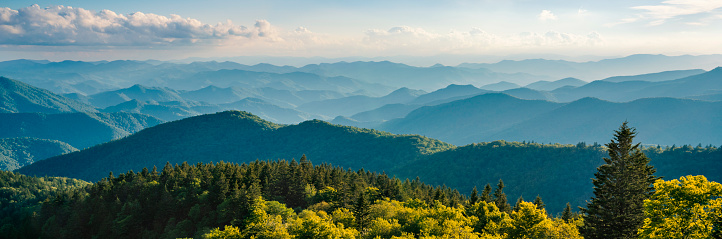 Beautiful mountain view with green mountains and layers of  foggy hills. View of Smoky Mountains from Blue Ridge Parkway. Near Asheville, North Carolina. Image for web header or banner.