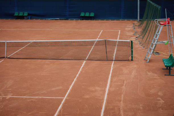 istock Tennis net and court 1335913362