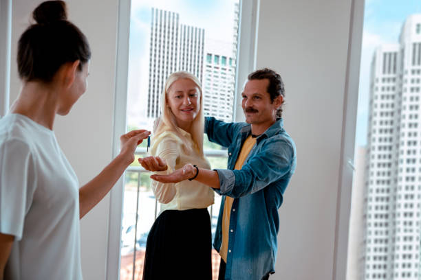 istock Handing keys of new apartment 1335913657
