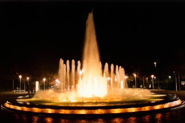 istock spectacular water fountain with its jets and lighting 1335915926