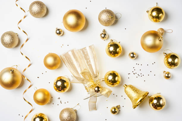 istock Christmas background with Golden colored decorations on white 1335925880