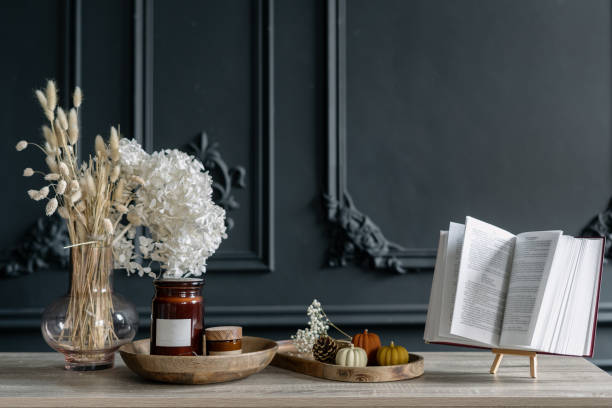 Furniture with different decorations against relief wall