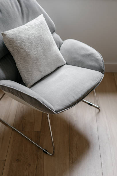 istock Comfort armchair with pillow in cozy room 1335927355