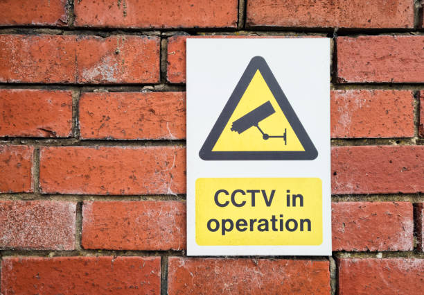 CCTV in Operation warning sign Close-up of a sign informing people that CCTV is in operation in the area. surveillance camera sign stock pictures, royalty-free photos & images