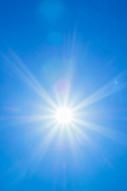istock Bright sun with beautiful beams in the sky 1335932680