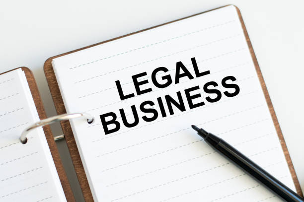 istock Legal Business, text on white notepad paper. 1335938574