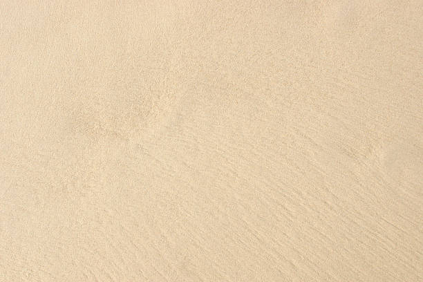 strand sand hintergrund - beach sand stock-fotos und bilder