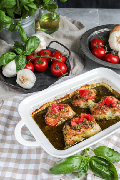 istock Italian Roast Chicken Breast with Pesto and Tomatoes 1335945228