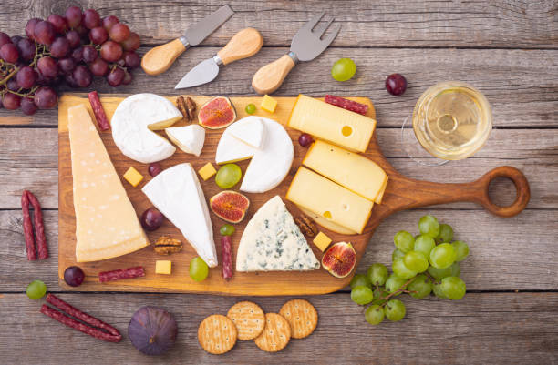 istock Cheese board with fruits and snack 1335960260