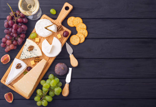 istock Cheese board with fruits and snack 1335960263