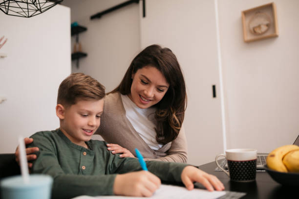 istock Caucasian mother bonding with her son at home 1335961040