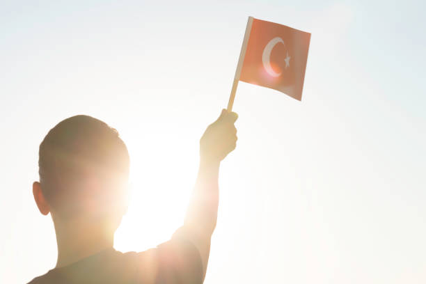 istock Woman with Flag 1335962229