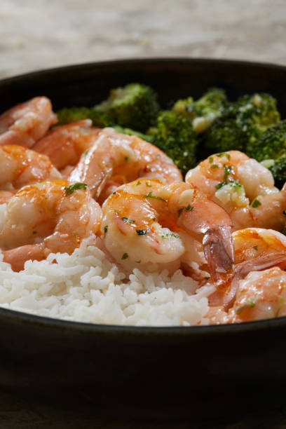 istock Shrimp and Rice Bowl with Steamed Broccoli 1335963800