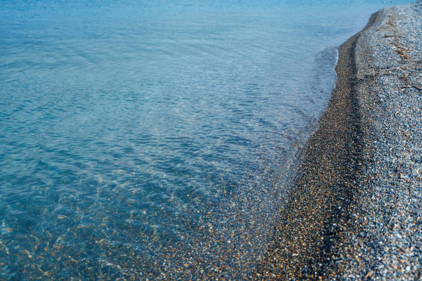 istock Pebbles Black Sea Coast. Beach with clear water 1335965432