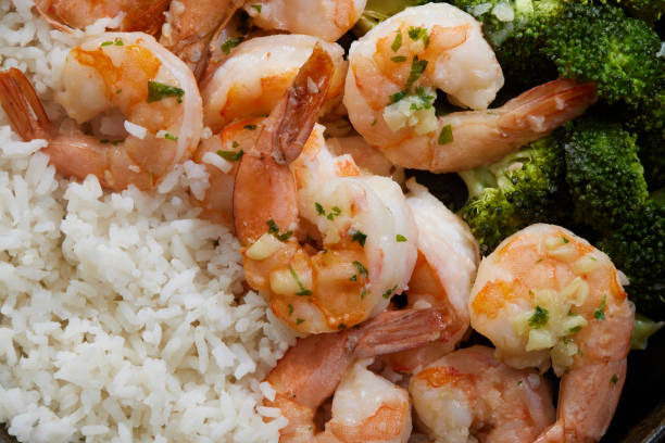 istock Shrimp and Rice Bowl with Steamed Broccoli 1335966052