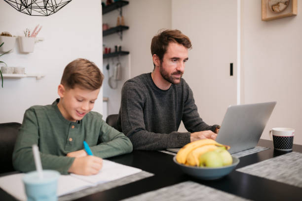istock Caucasian father and son bonding at home 1335975840