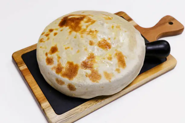 Photo of matka biryani, indian flavored rice dish covered with bread dough
