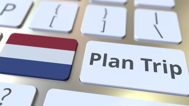PLAN TRIP text and flag of the Netherlands on the keyboard