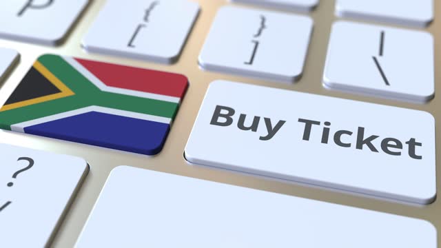 BUY TICKET text and flag of South Africa on the buttons on the computer keyboard. Travel related conceptual 3D animation