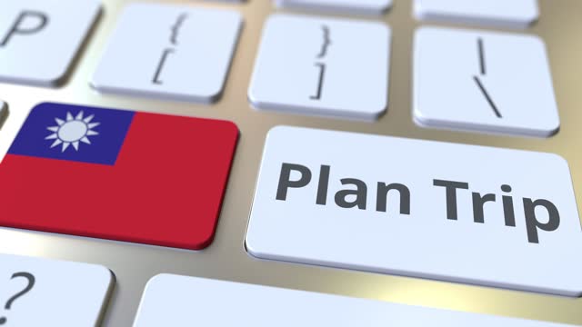 PLAN TRIP text and flag of Taiwan on the computer keyboard, travel related 3D animation