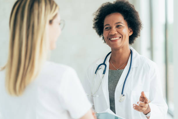 istock Two doctors talking at hospital 1335983661