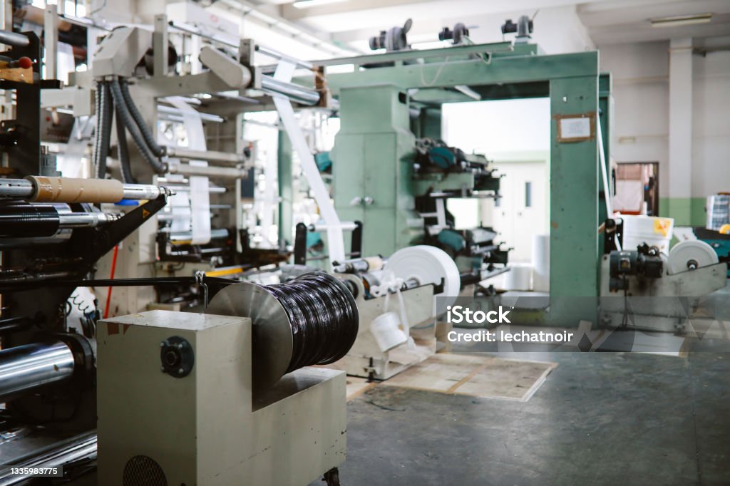 Biodegradable plastic bags production machinery Biodegradable Stock Photo