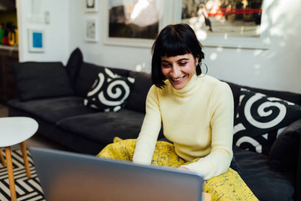 istock Young Caucasian woman casually working from home 1335983954