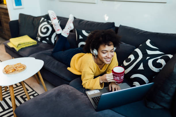 istock Young African American woman casually working from home 1335984918