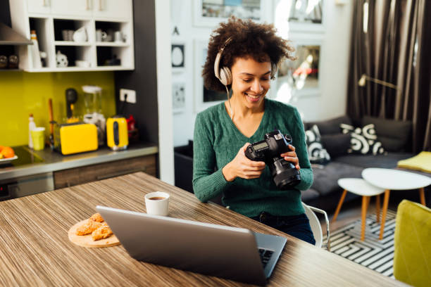 istock Young African American woman casually working from home 1335984950