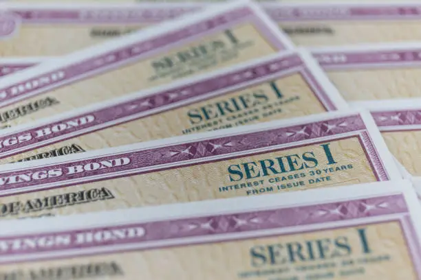 Photo of US Savings Bonds. Savings bonds are debt securities issued by the U.S. Department of the Treasury. They are issued in Series EE or Series I.