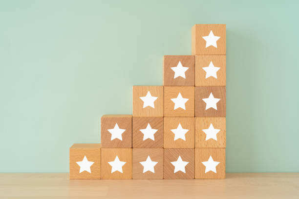 istock Scoring; Wooden blocks with star mark. 1335990147